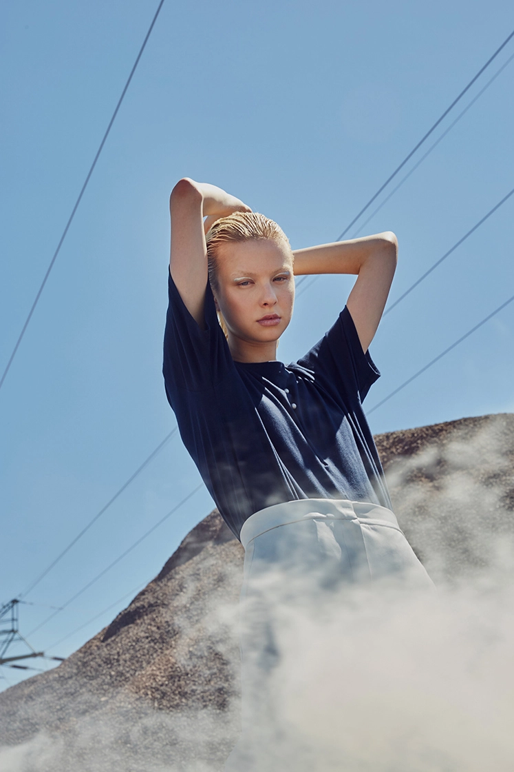 female model tilted view with smoke in front