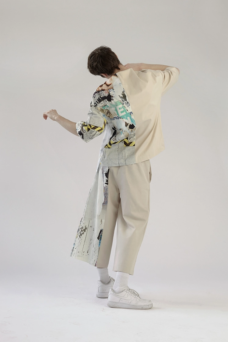 male model turning photographed from the back